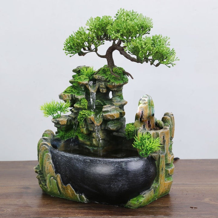 Elegant Feng Shui vattenfall heminredning, symboliserar pengar & rikedom. En lyxig bordsdekoration.