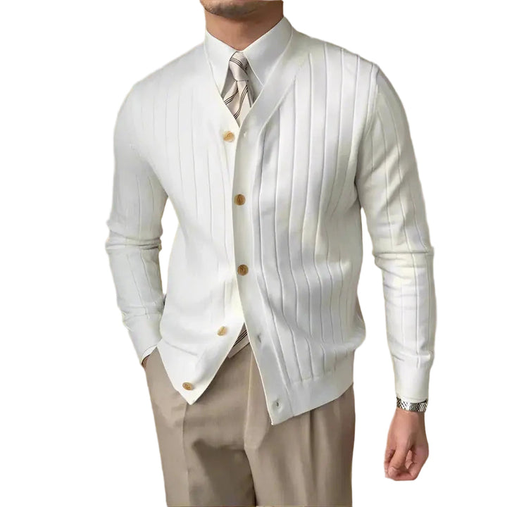 Figurnära herrkofta i elegant italiensk design, tillverkad av mjuk ullblandning med ribbstickad detalj.