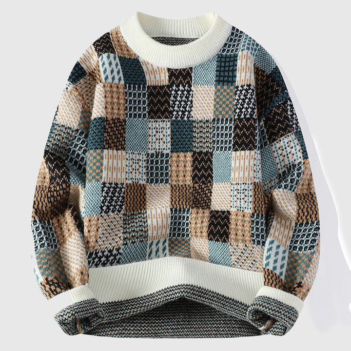 Trendig chunky stickad tröja för kvinnor med färgrik lapptäcksdesign, ger mysig vintervärme.