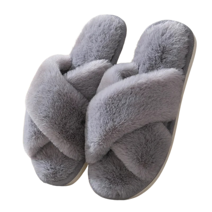 Fluffiga damtofflor för inomhusbruk, designade för lyxig komfort och avkoppling hemma.
