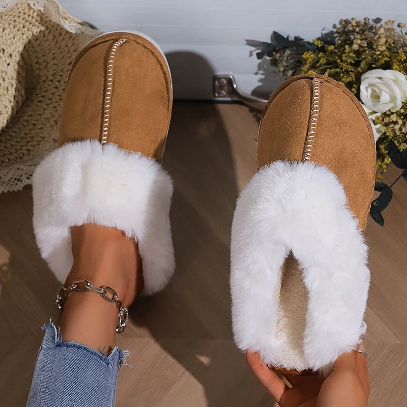 Fluffiga inneskor i mockastil, designade för damer som söker både värme och bekvämlighet.