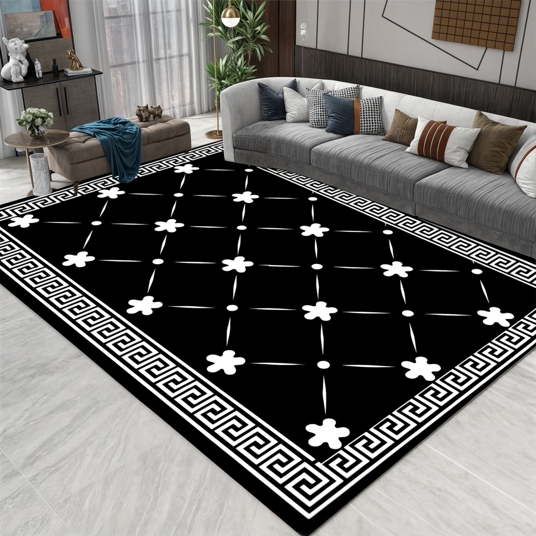 Detaljbild på en 3D-golvmatta med optisk virveleffekt i svart och vitt, modern och halkfri.