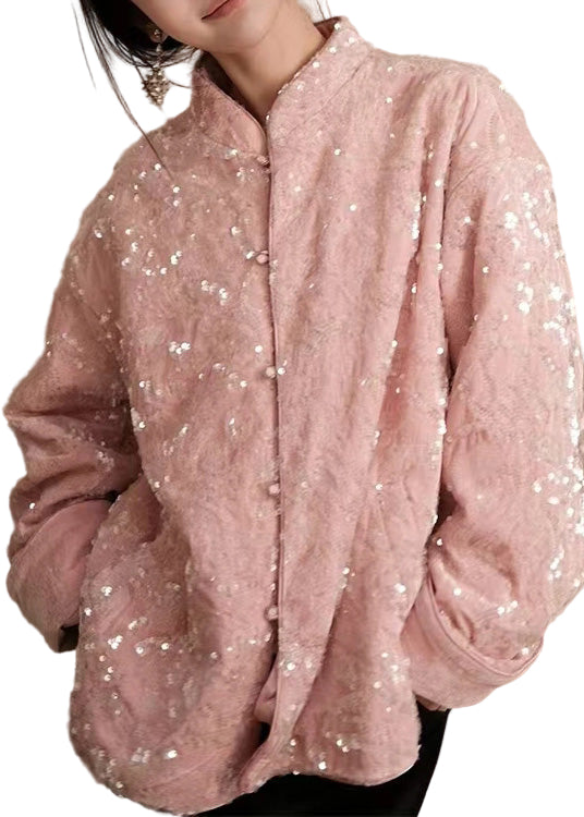 Glamorös glittrande långärmad damjacka, perfekt för festliga tillfällen. Elegant och trendig passform.