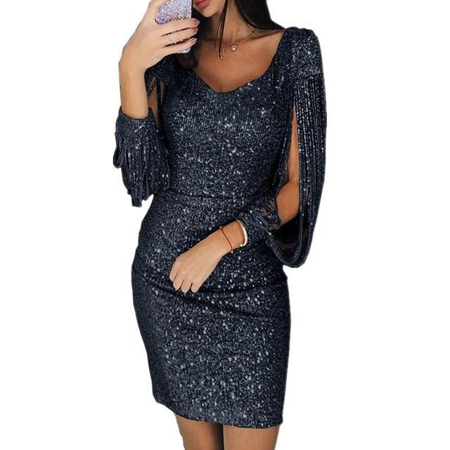 Glamorös paljettklänning, perfekt för festmode. Elegant damklänning med V-ringning för en oförglömlig kväll.
