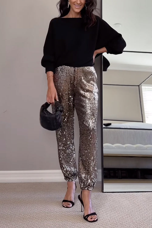 Svarta högmidjade joggers med paljetter för kvinnor, bekväma och trendiga.