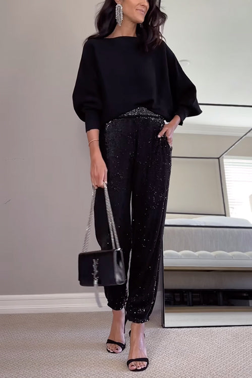 Bekväma svarta paljettbyxor med hög midja, en trendig variant av joggers.