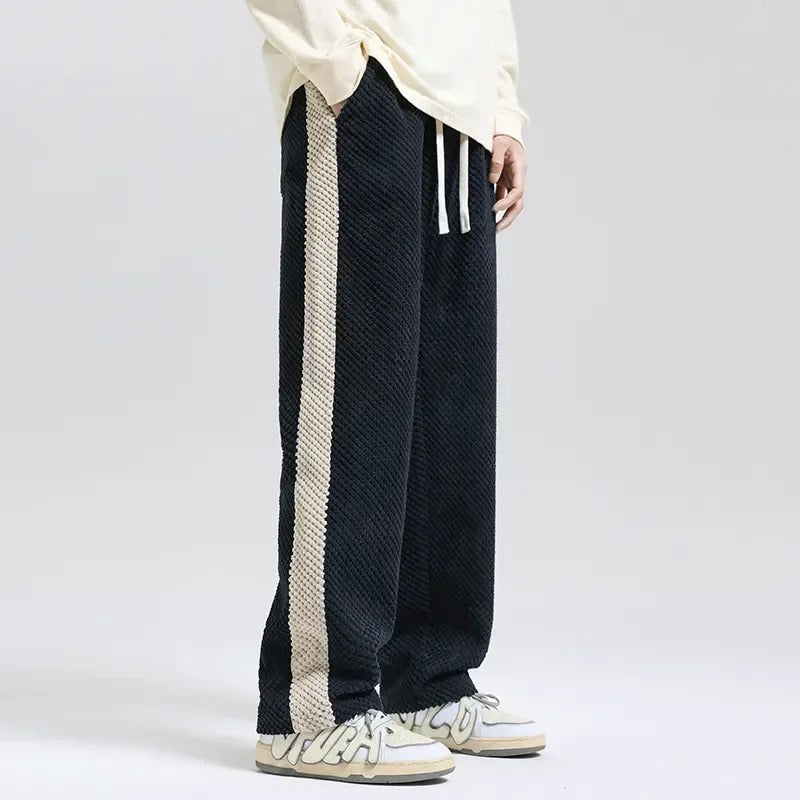 Bekväma svarta herr sweatpants med dragsko, designade för både stil och ultimat vardagskomfort.