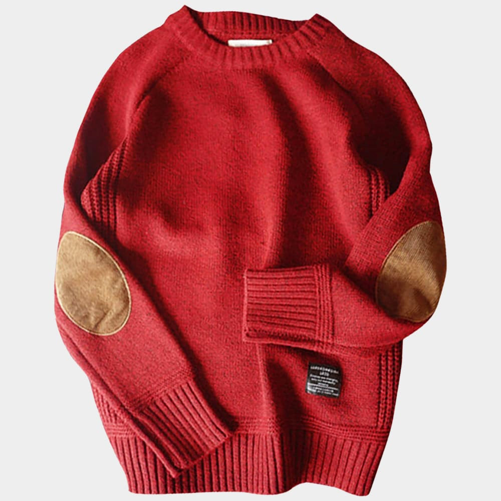 Elegant röd herrtröja med ribbade detaljer och axellappar. Mångsidig och bekväm för höst.