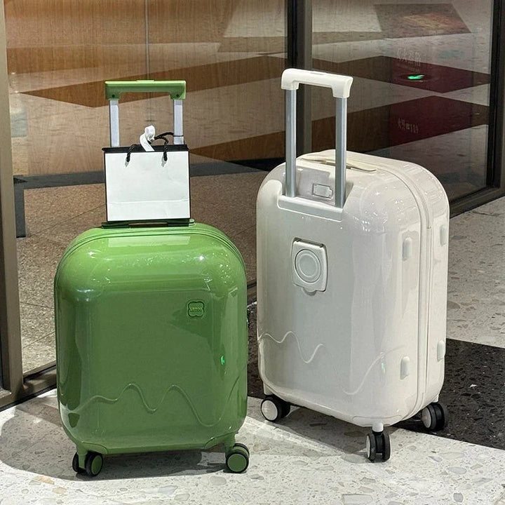 Tuff grå rullväska för barn med hårt skal & säkerhetslås. Idealisk trolley för bagage.
