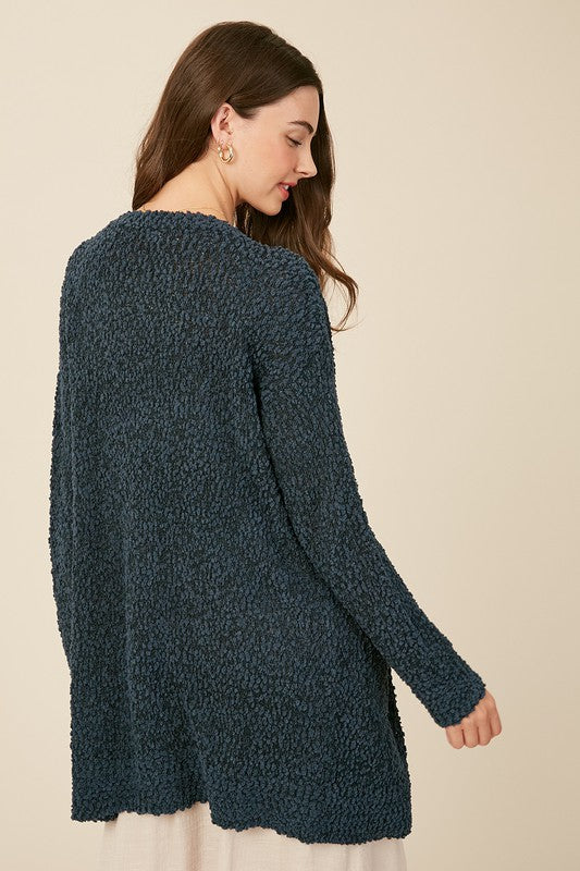 Bekväm och mysig grön damkofta i stickad design. En stilsäker öppen cardigan för höst- och vintermode.