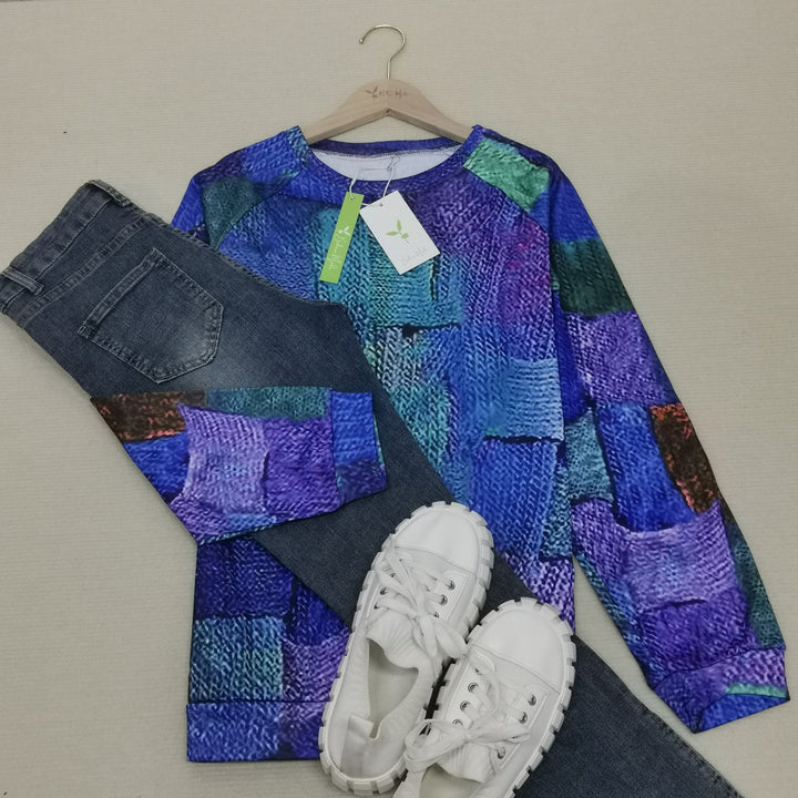 Ledig damtröja med rund hals i blå färg, perfekt som vardagströja och höstmode.