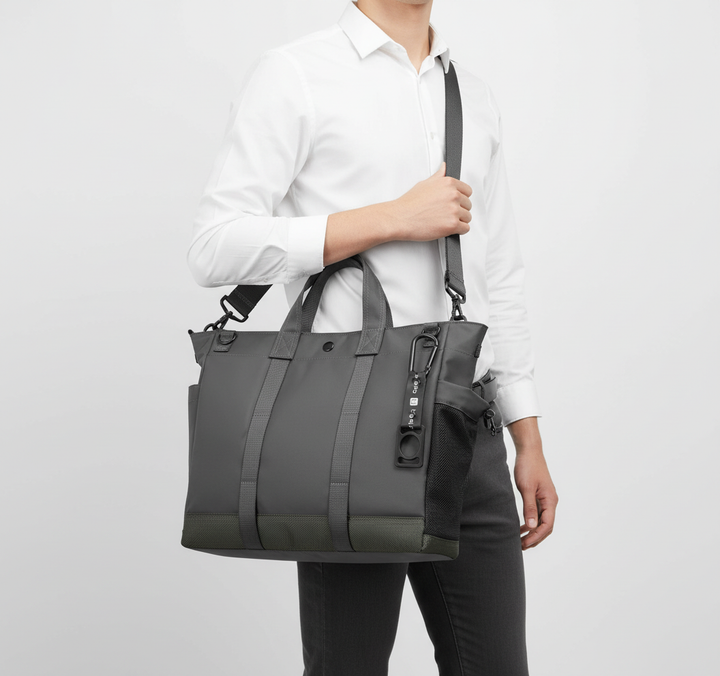 Ergonomisk datorväska grå unisex med vadderat fack för laptop. Reseväska för arbete, med smart förvaring.