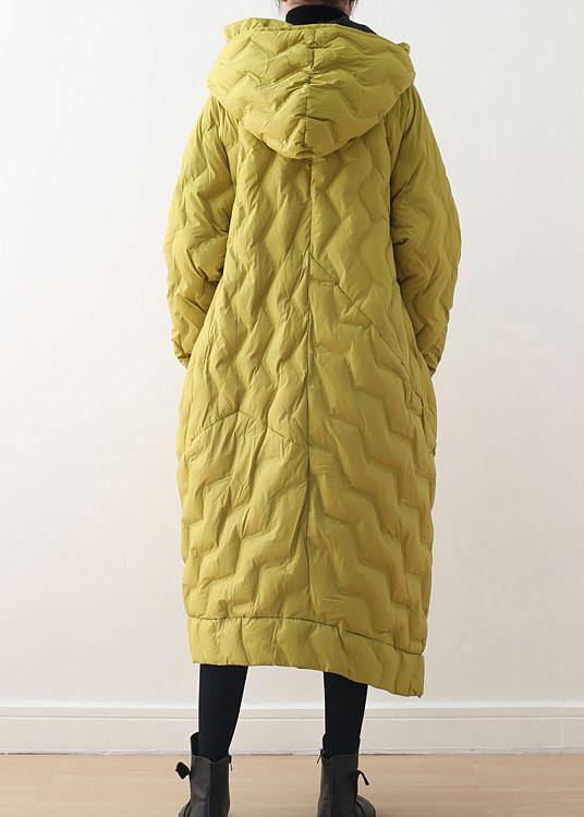 Casual gul damkappa i bomullsblandning med huva. Asymmetrisk design, perfekt för vår och höst.