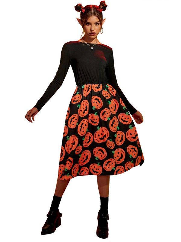 Elegant damklänning med unikt pumpatryck, bekväm midilängd för halloweenfirande och höstmode.