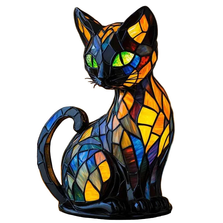 Handgjord bordslampa med kattdesign i färgat glas, perfekt för mysig belysning i sovrummet.