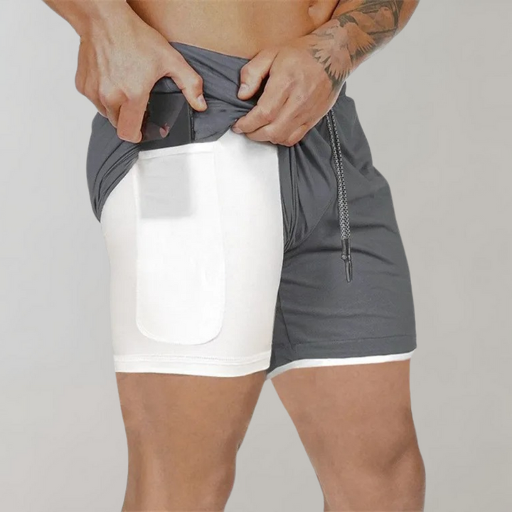 Bekväma Herr 2-i-1 shorts i snabbtorkande material, idealiska för löpning.