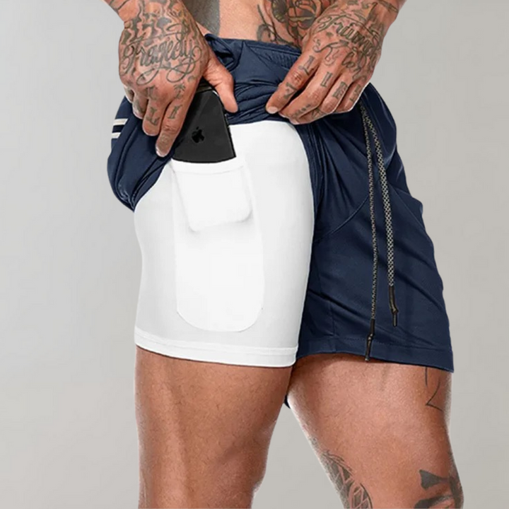 Grå Herr 2-i-1 shorts med praktisk dragkedjeficka för säker förvaring.