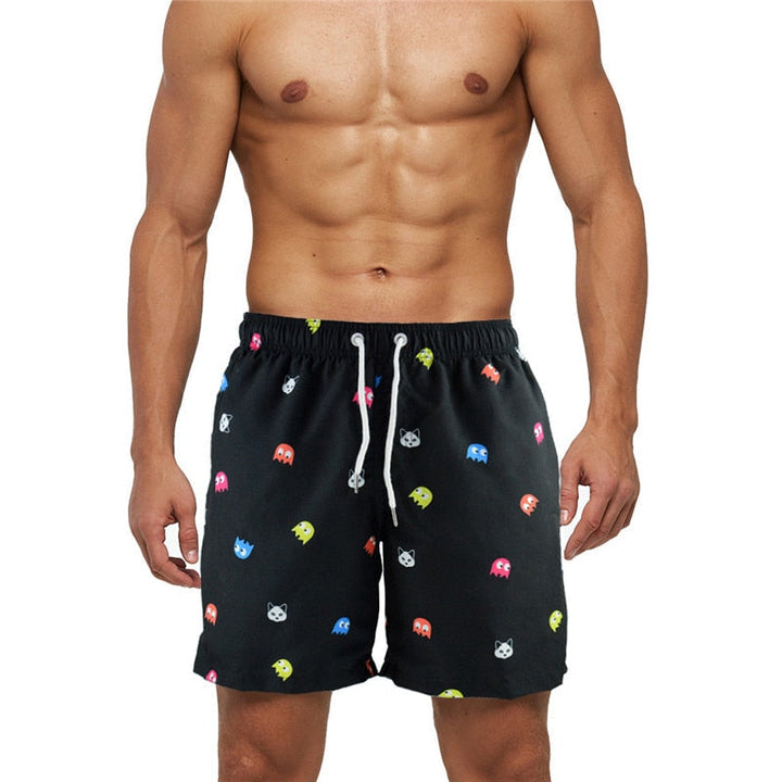 Herr boardshorts för semester. Snabbtorkande badbyxor i polyester, perfekta för strand, simning och sommaräventyr.