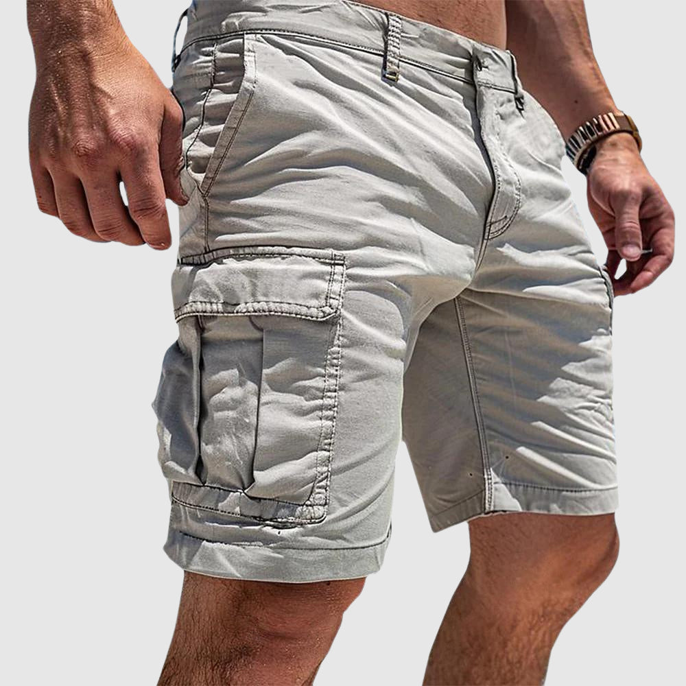 Herr cargo shorts, beige, rymliga fickor, andningsbart tyg för utomhusäventyr, komfort och stil under varma dagar.