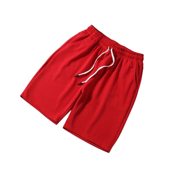 Lätta sommarshorts för herr i beige, utmärkta för varma dagar och fritidsaktiviteter utomhus.
