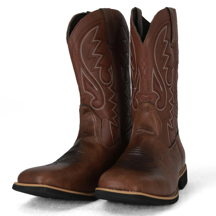 Närbild på herr chelseaboots-stil cowboystövlar i brunt PU-läder.