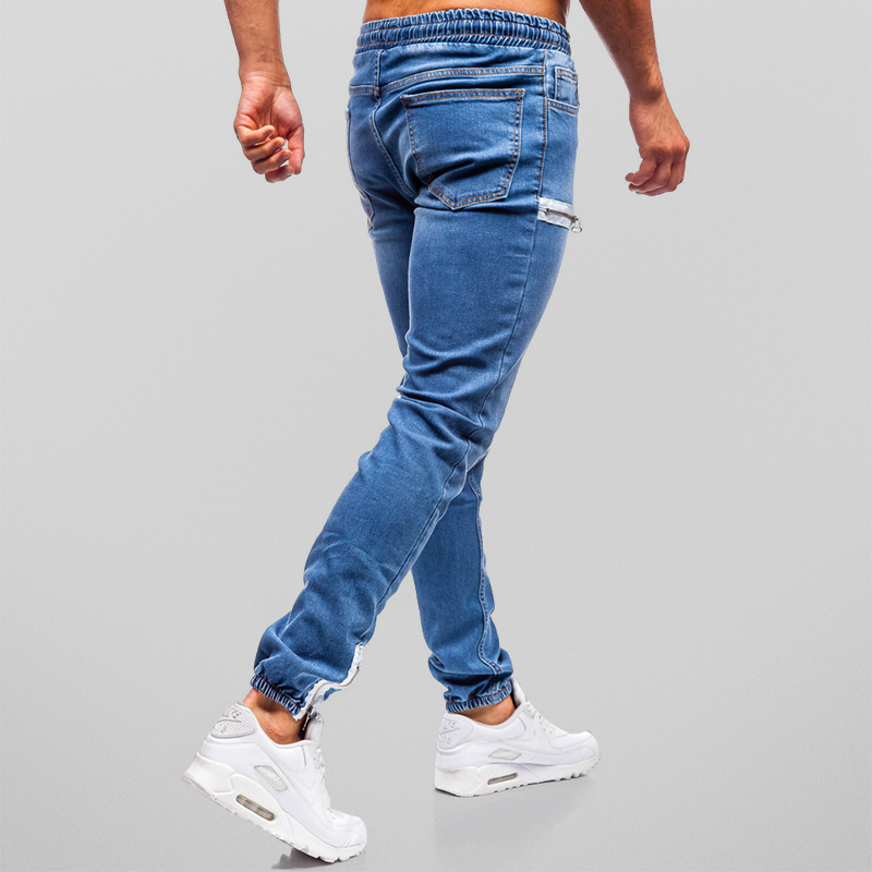 Avslappnade herr joggingbyxor med snygga dekorativa blixtlås. Perfekta vardagsbyxor med en sportig touch.