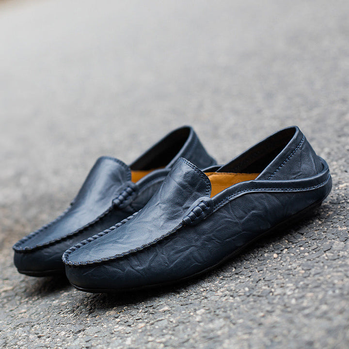 Klassiska svarta herr loafers, en stilren sko som förhöjer varje outfit.