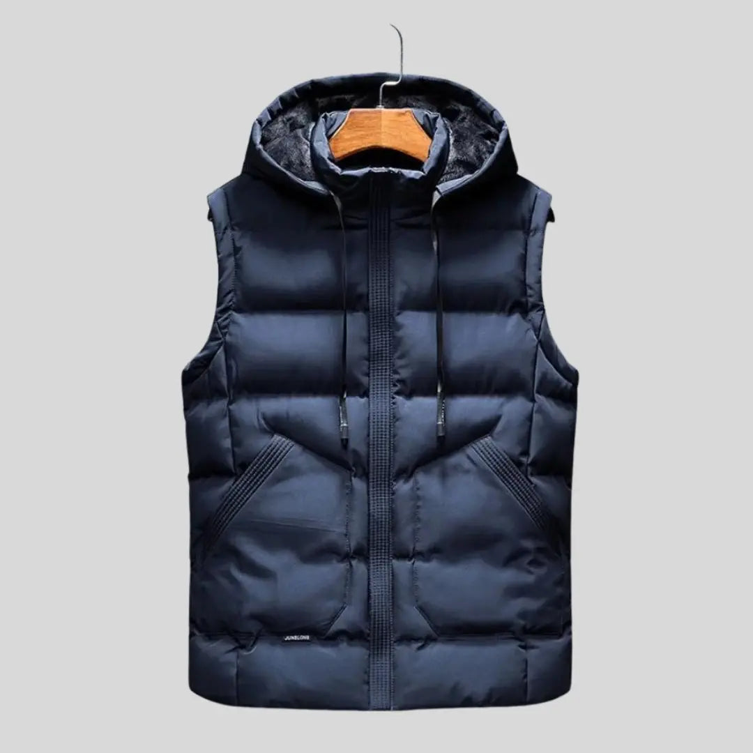 Modern herr huvväst med stilren design, kombinerar funktionalitet med en trendig look för den medvetne.