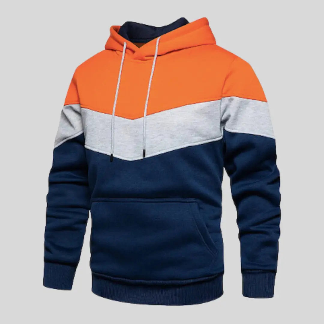 Man bär avslappnad herr patchworktröja, bekväm stil för höst och vår. Trendig stickad design.