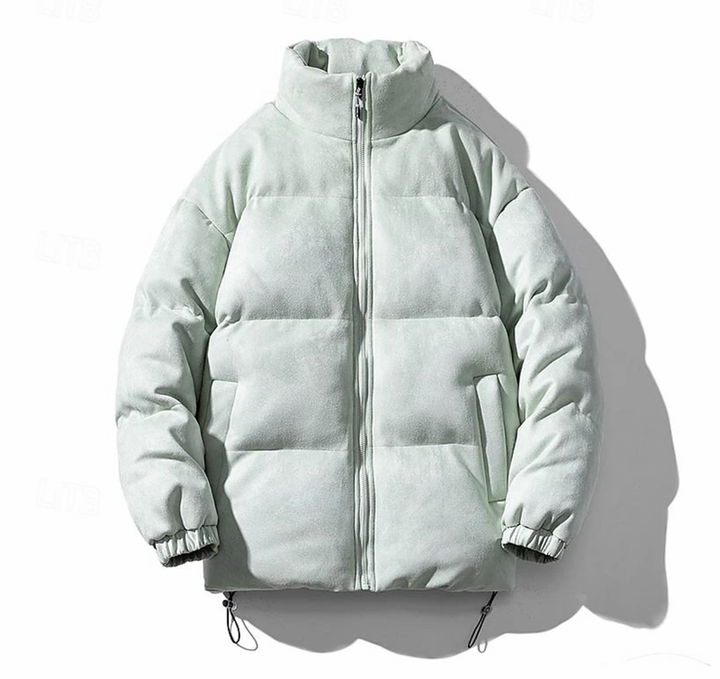 Varm och stilren quiltad herrjacka, perfekt som modern vinterjacka. Lätt design, grå färg.