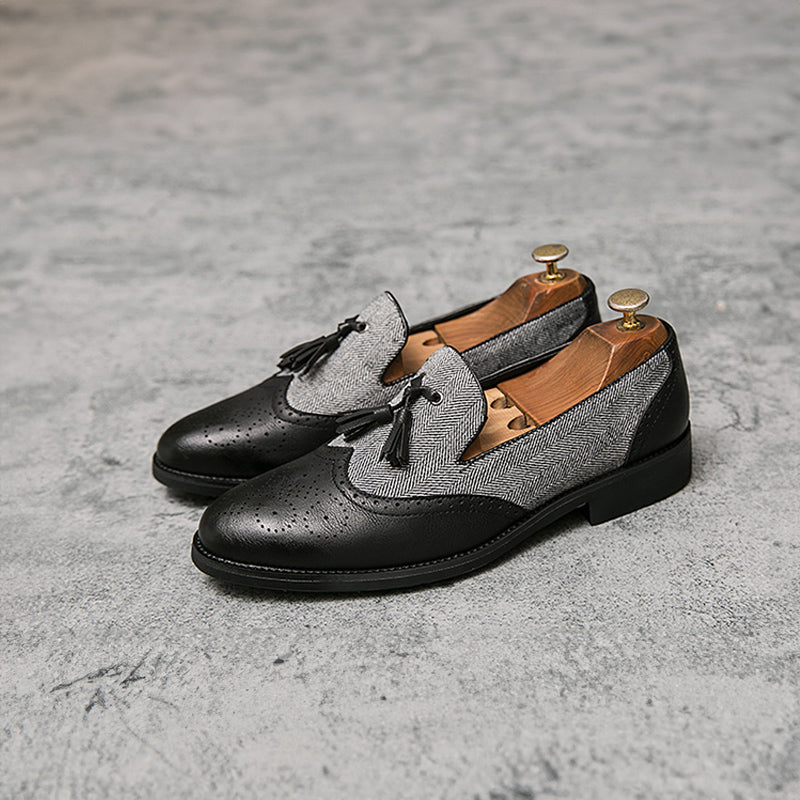 Eleganta retro loafers i läder för herr, med tofsar som passar både formell klädsel och smart casual outfits.