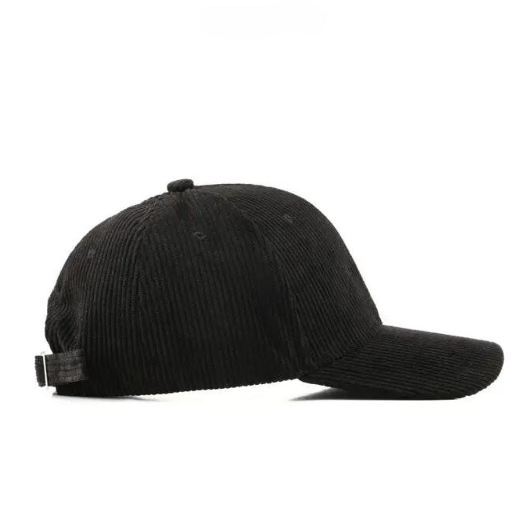Klassisk ribbad herr keps i neutral färg, en mångsidig accessoar för varje stil och säsong.