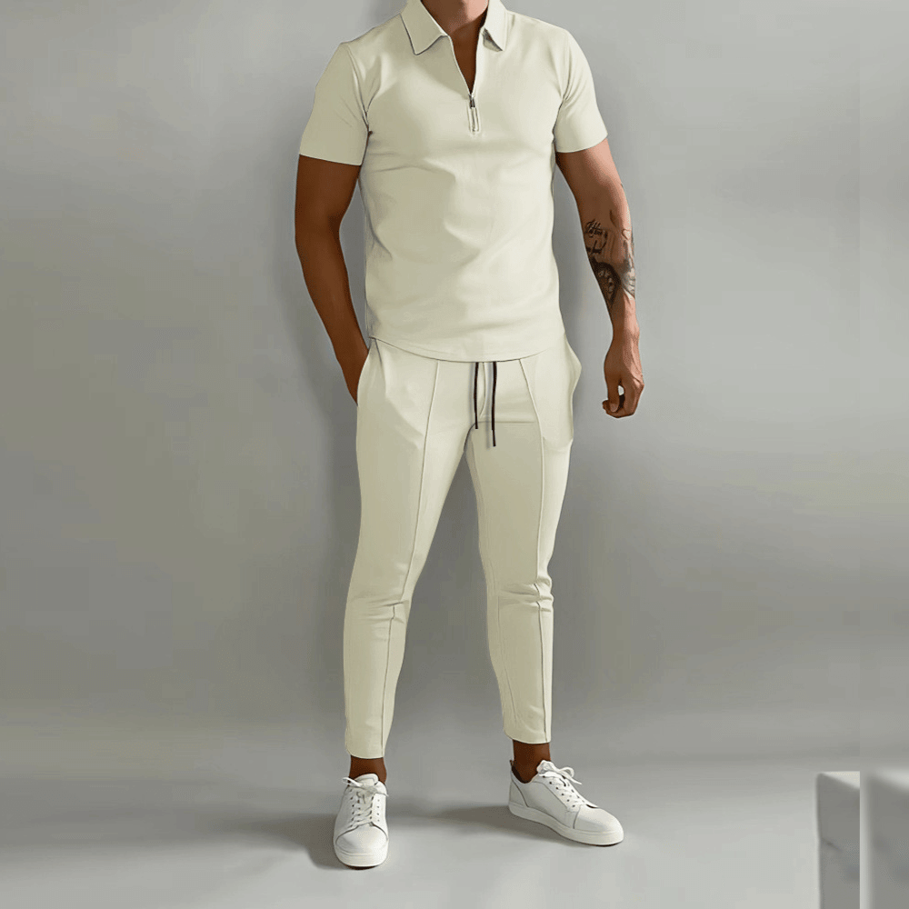 Herr träningsset med slim fit joggingbyxor & tröja med halv dragkedja. Perfekt som vår- och sommarkläder.