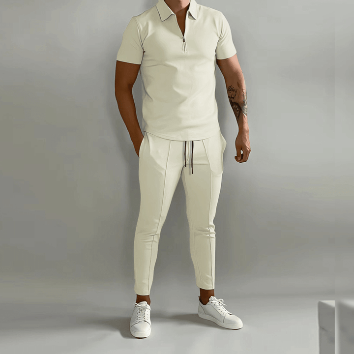 Herr träningsset med slim fit joggingbyxor & tröja med halv dragkedja. Perfekt som vår- och sommarkläder.