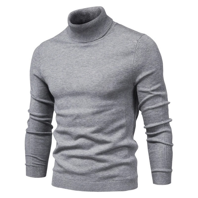 Stack av flera slim fit polotröjor i olika färger, visar mode och variation.