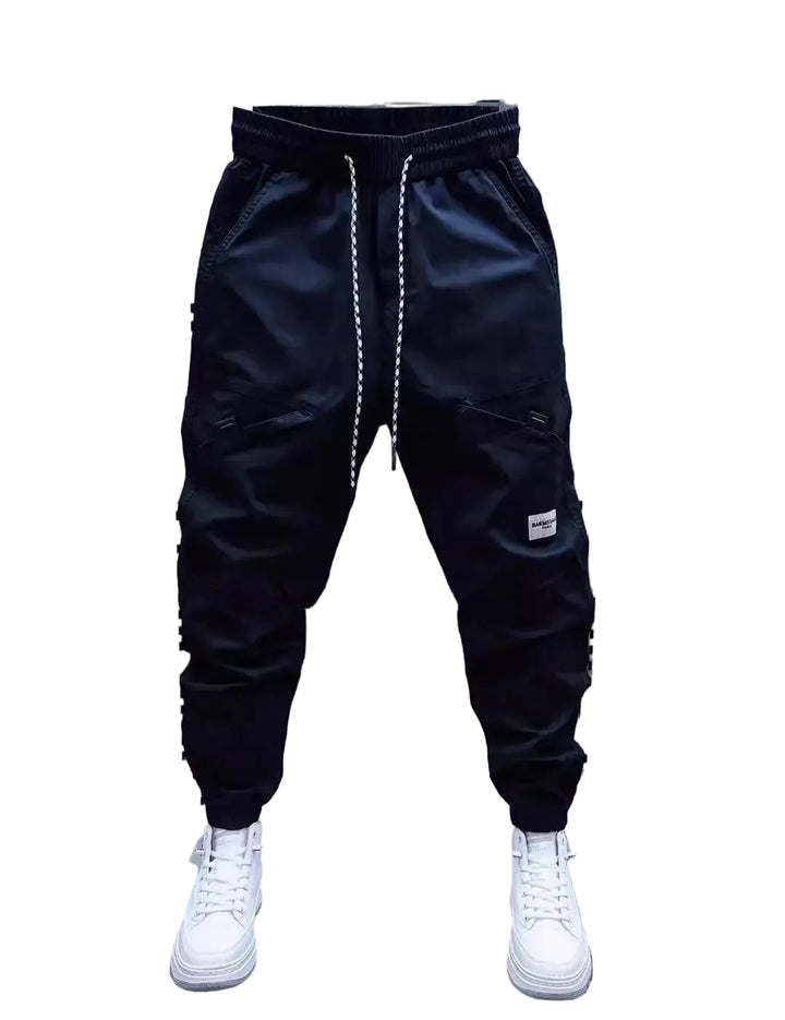 Herr sportbyxor för optimal komfort & dynamisk stil. Perfekta träningsbyxor för aktiv livsstil.