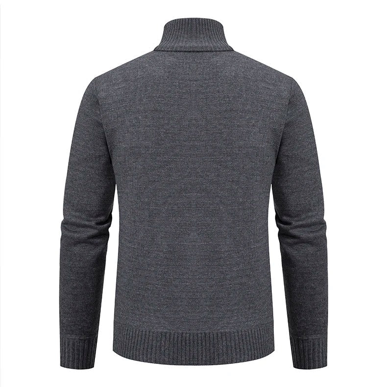 Detalj av mönster på stickad herrtröja, polyester och elegant design