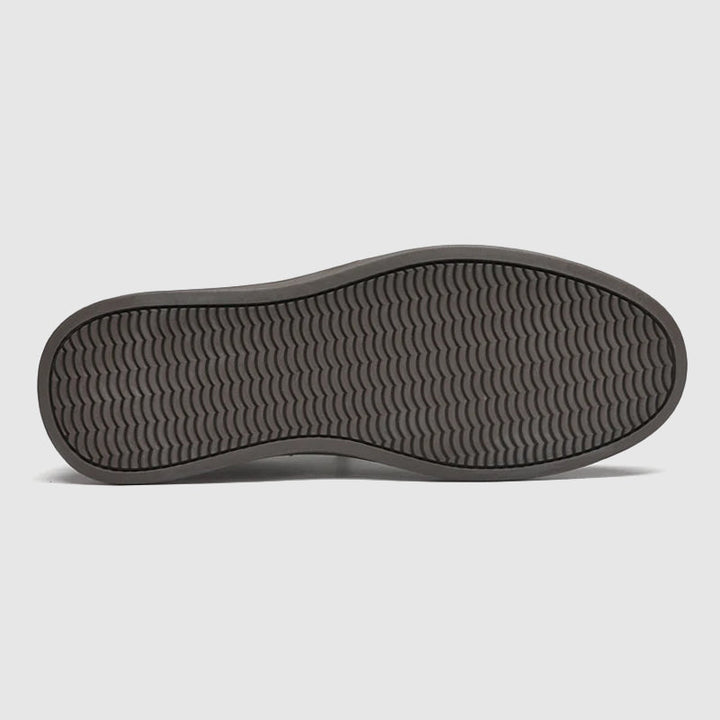 Herr stilrena slip-on sneakers som kombinerar komfort, enkelhet och modern design för vardagen.