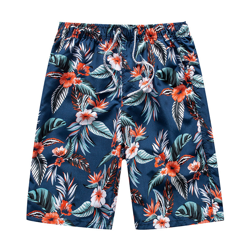 Stilfulla herr badshorts med trendigt tryck, snabbtorkande material för soliga dagar och vattenaktiviteter.
