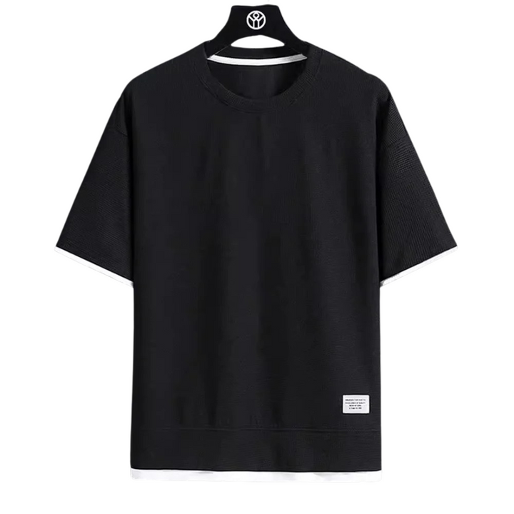 Stilren enfärgad herr T-shirt med rundhals och våffeldesign, ett tidlöst basplagg.