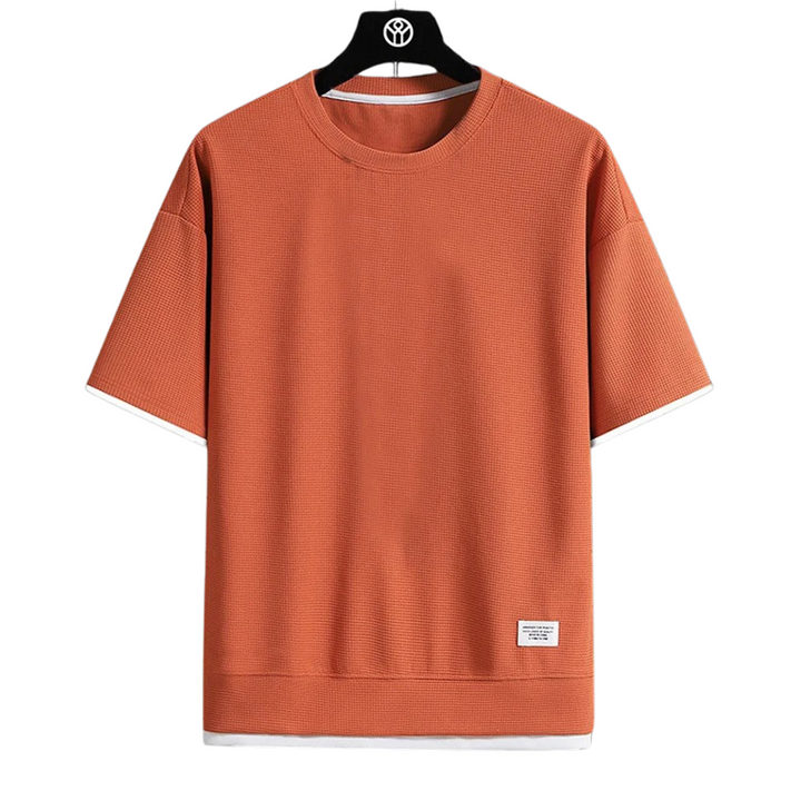 Rundhalsad herr T-shirt med unikt våffelmönster, ett mångsidigt och trendigt modeplagg.