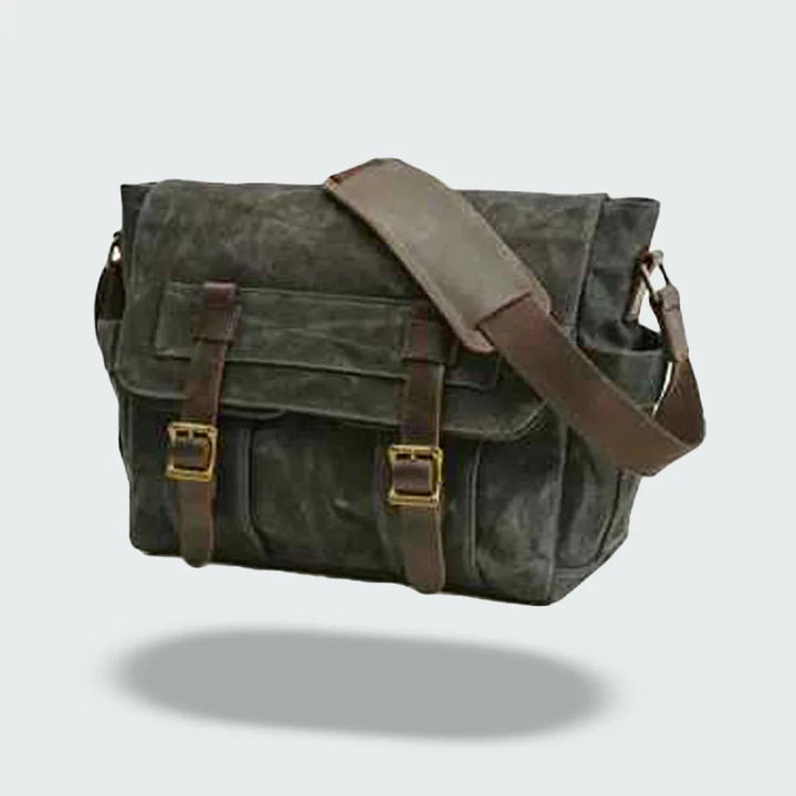 Organiserad retro budväska för herr med fack för laptop & tillbehör i slitstark canvas.