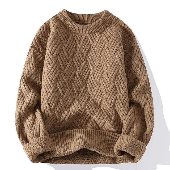 Klassisk herrtröja med rund hals i vintage stil. Stickad och bekväm för avslappnad look under vintern.
