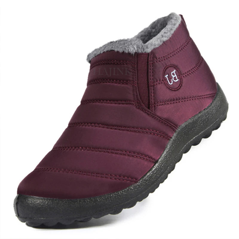 Herr vinter slip-on skor med varmt fleecefoder, vattenavvisande yttertyg för komfort i kallt väder.