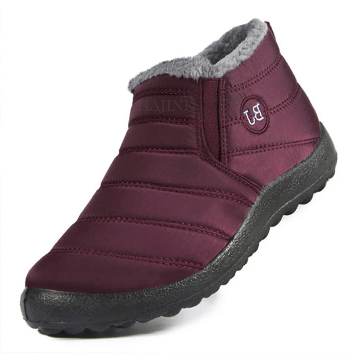 Herr vinter slip-on skor med varmt fleecefoder, vattenavvisande yttertyg för komfort i kallt väder.