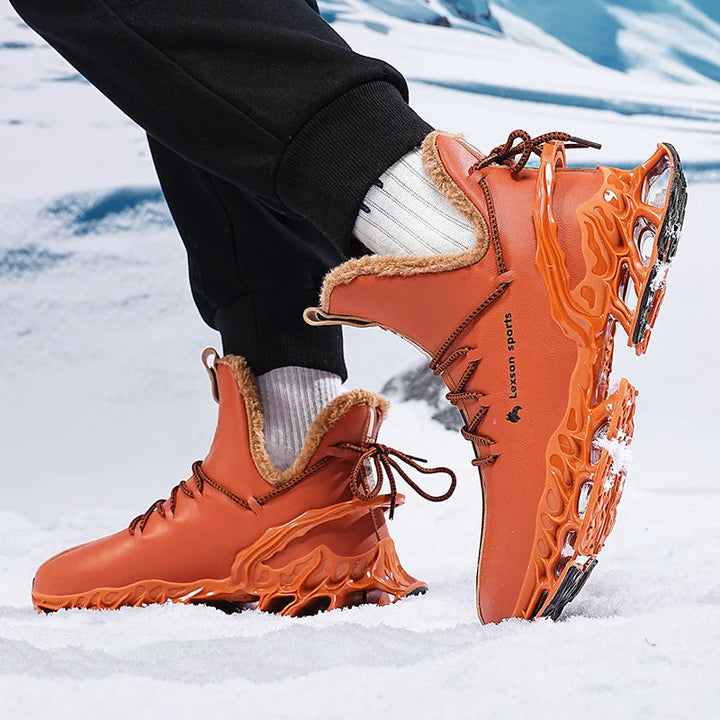 Bekväma och varma vintersneakers för herr. Hög modell i svart/orange, perfekta för utomhusaktiviteter.