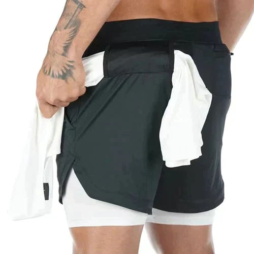 Sidoprofil av herrar 2-i-1 sportshorts som visar den flexibla passformen, idealisk för träning och sport.