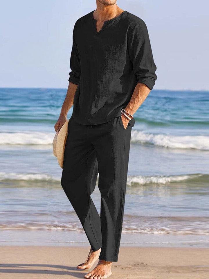 Stilren herrskjorta i avslappnad design, matchar byxsetet. Perfekt för bekväm, löst sittande vår- och sommaroutfit.