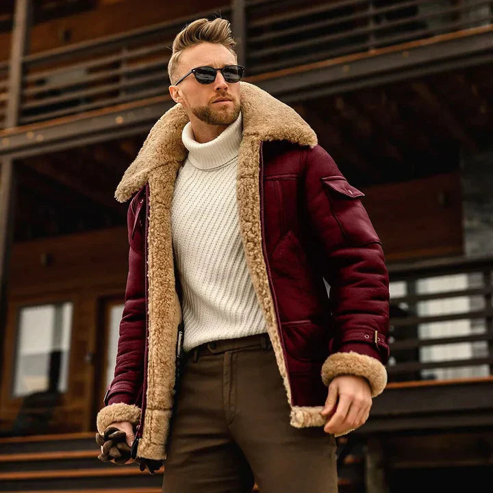 Man bär en klassisk vinterrock, visar upp dess eleganta snitt och mångsidighet för stilrena looks.