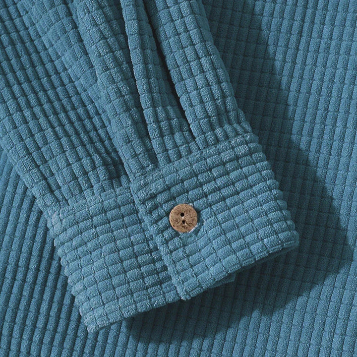 Modern herrjacka i manchesterstil med huva, bekväm overshirt för en avslappnad och trendig look.